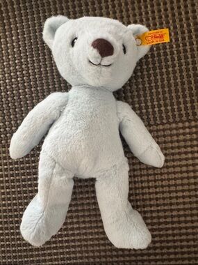 Light Blue Plush Bear with Signature Yellow Ear Tag